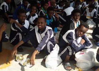 مكافحة الهجرة طرابلس يستلم 98 مهاجرا من مركز إيواء زوارة