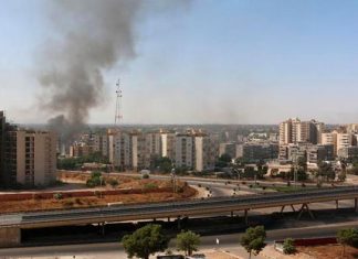 مقتل مدني وإصابة أربعة جراء تجدد الاشتباكات جنوب العاصمة طرابلس