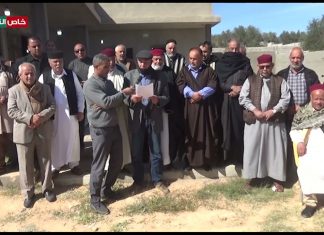 شاهد – بيان قبائل ترهونة خلال لقائها بوفد من قبائل برقة مطالبين بتسليم المتورطين في الجرائم